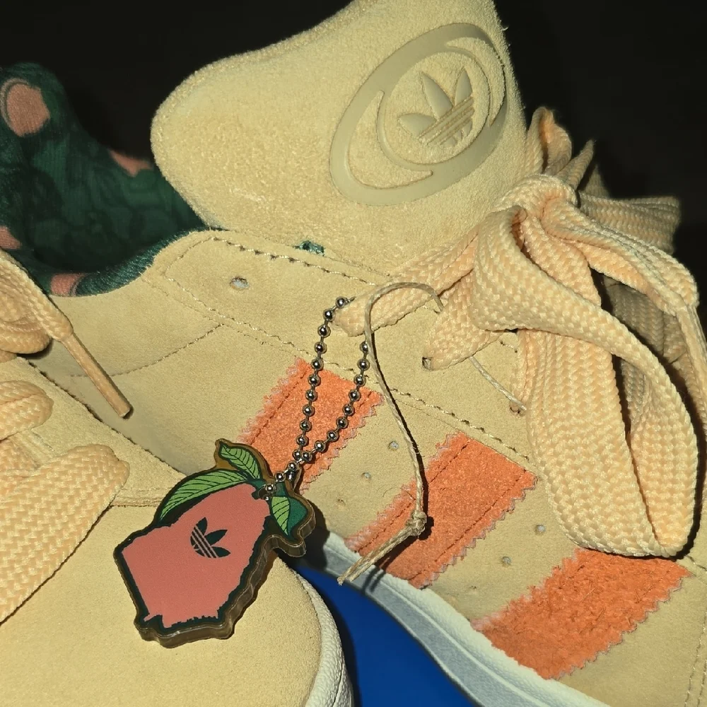 adidas Suede Low-Top Sneakers in Peach with Orange Stripes